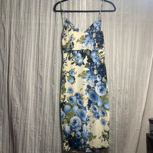 G By Guess floral dress with a drop back.